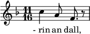 
{
    \clef treble
    \key d\minor
    \autoBeamOff
    \time 11/16
 c''4 a'8 f'8. r8
}
\addlyrics {
-_rin an dall,
}
