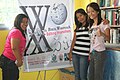 Some participants during the morning session pose with the event tarp