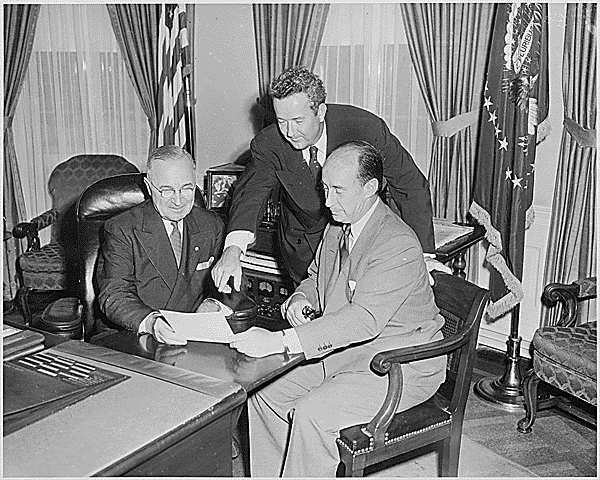 president truman signs executive order 9981. States district courts.
