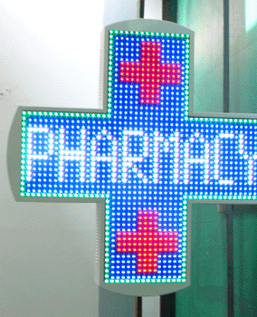 English: LED pharmacy cross in full color Fran...