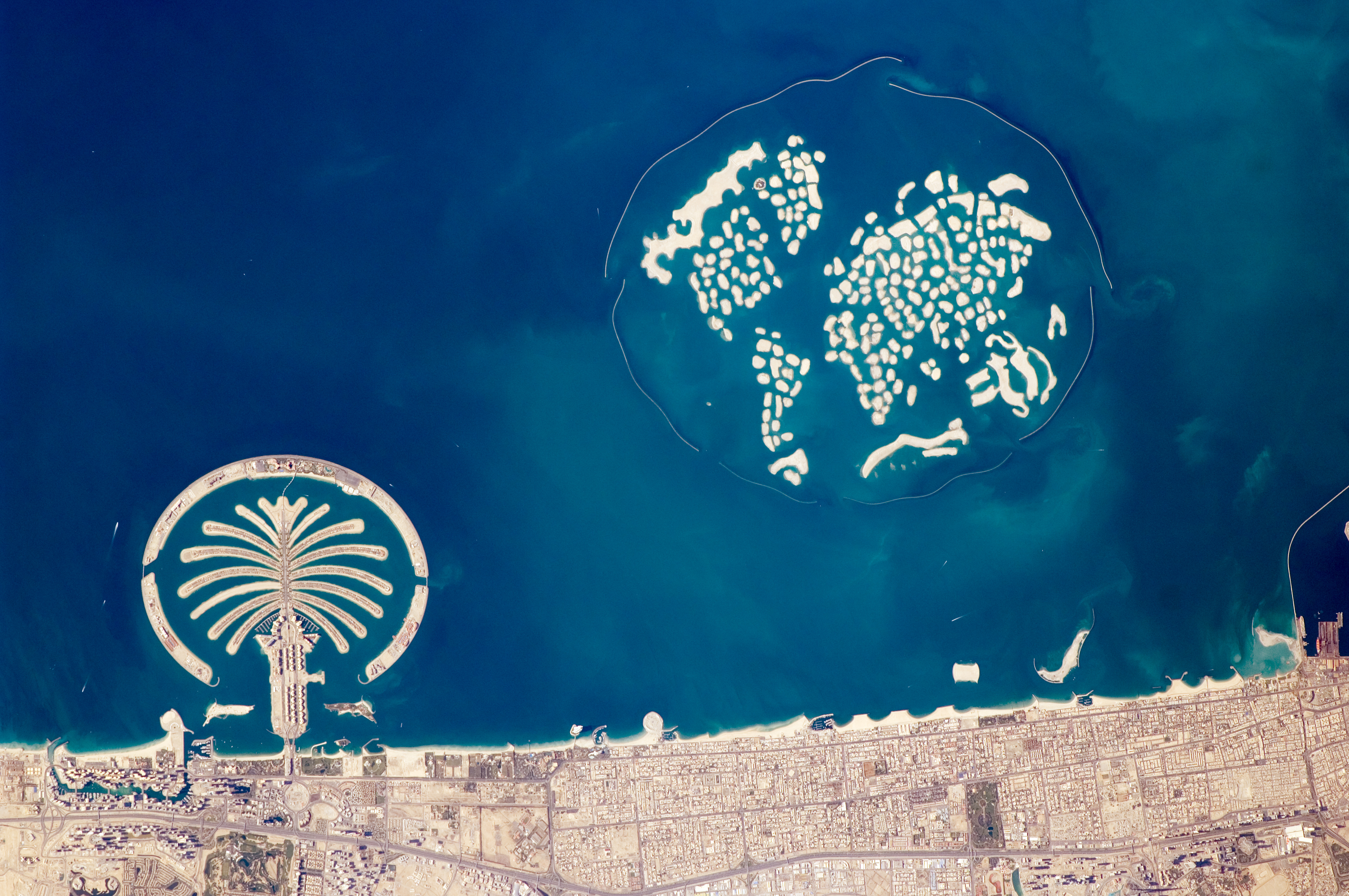 Image of the world and palm tree islands in Dubai. 