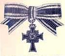 Illustration: Optional semi-official approved miniature version of the Mother's Cross measuring about 2 cm, with attached ribbon bow, as depicted in the original supply catalogue produced by LDO-approved medal maker Boerger & Co., (Beco) of Berlin. Deutsches Reich Miniature Format Mother's Cross of Honour.jpg