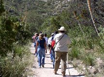 A group of people hiking in the Guadalupe Moun...
