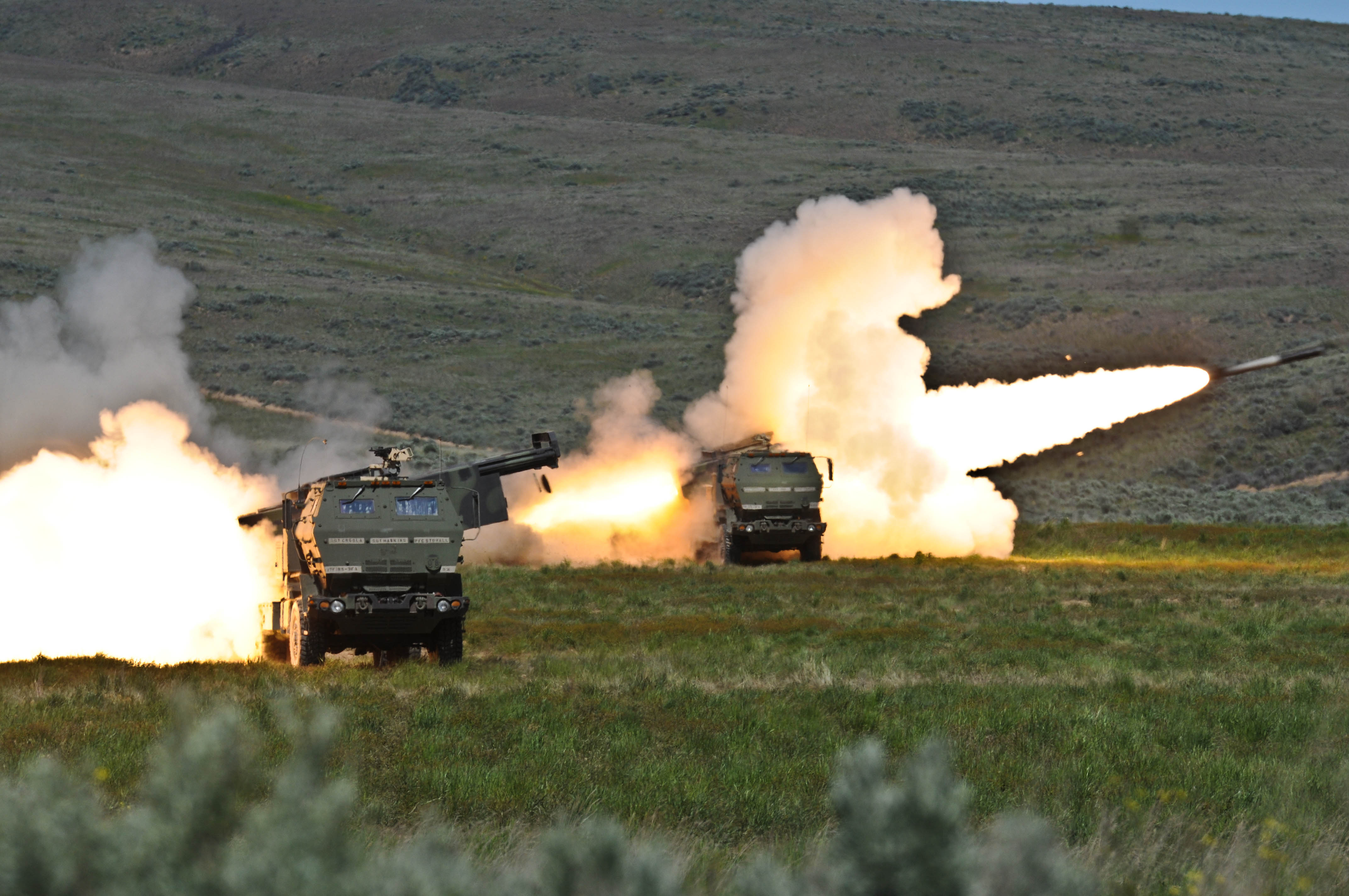 http://upload.wikimedia.org/wikipedia/commons/2/20/Firing_High_Mobility_Artillery_Rocket_systems.jpg