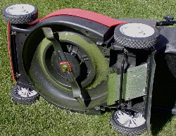 Photo of underside of electric lawn mover