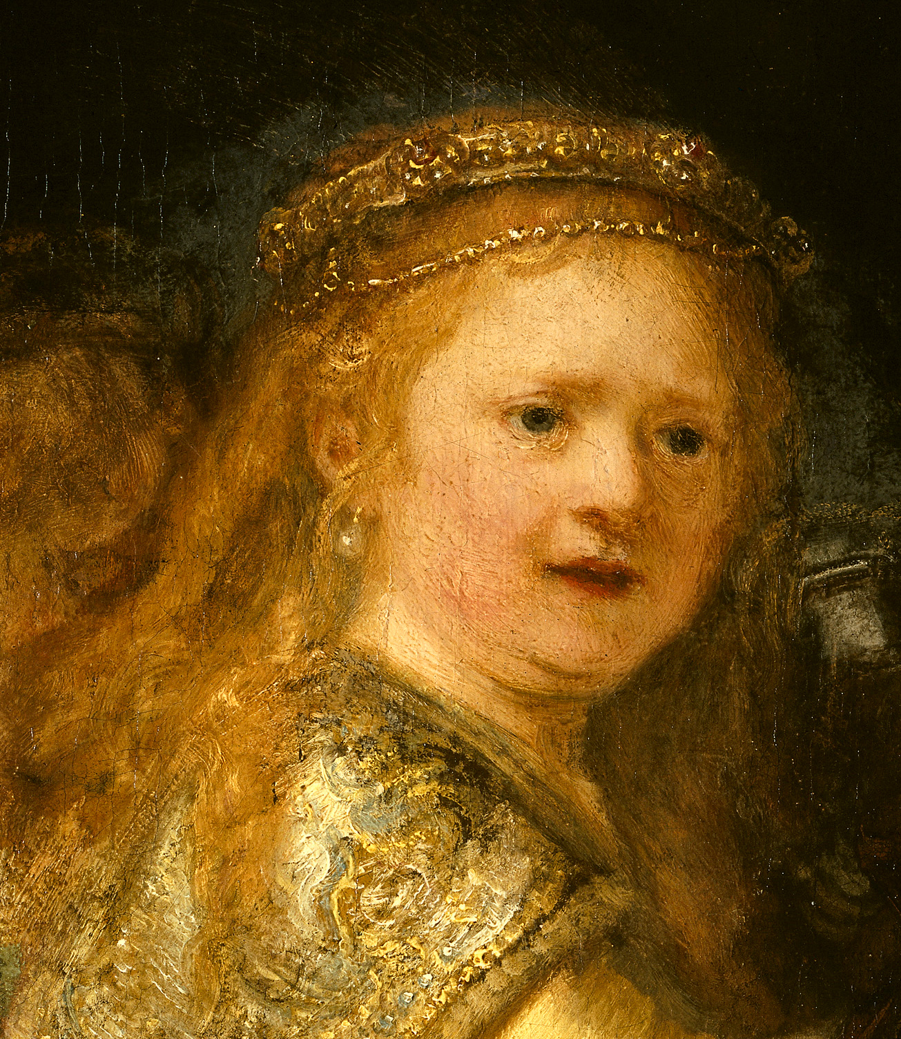http://upload.wikimedia.org/wikipedia/commons/2/28/Rembrandt_Night_Watch_Girl.jpg