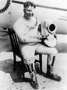 Wiley Post, first to fly solo around the world, in an early pressure suit for high-altitude flying - Wikimedia photo