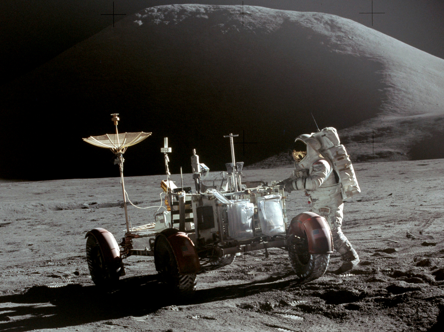 http://upload.wikimedia.org/wikipedia/commons/2/2e/Apollo_15_Lunar_Rover_and_Irwin.jpg