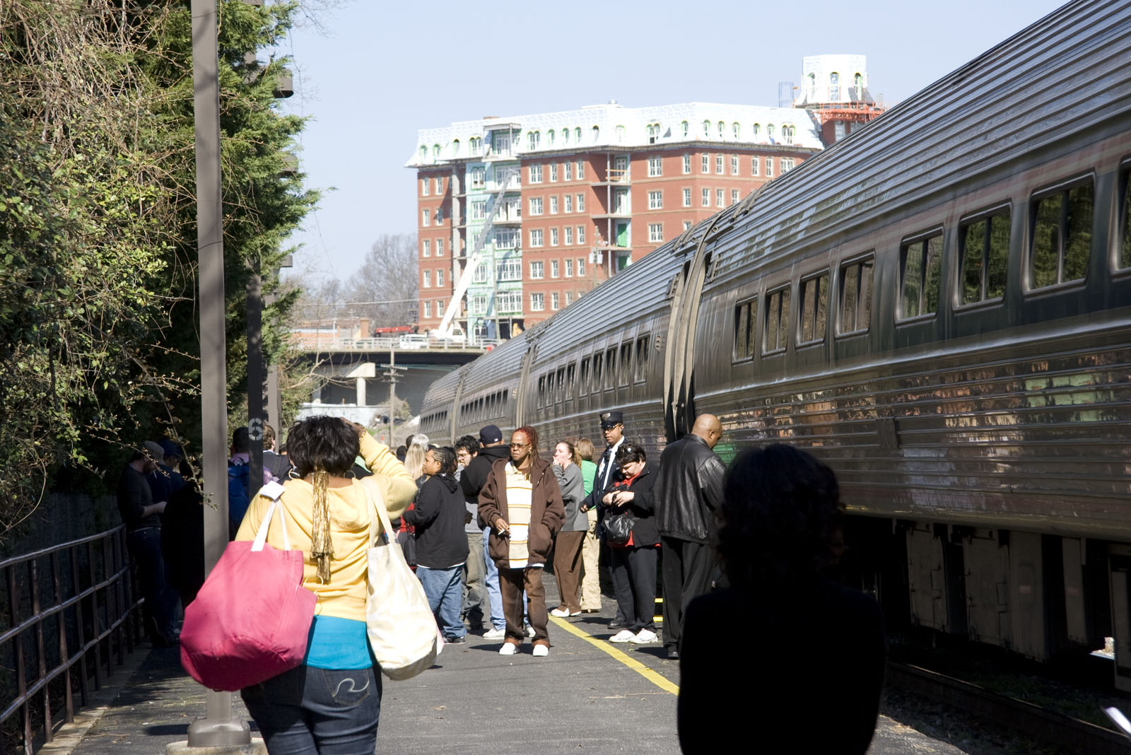 passengers boarding train