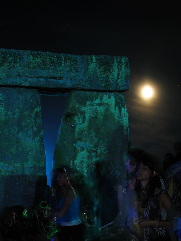 Dancing around a Stonehenge dolmen at Summer solstice