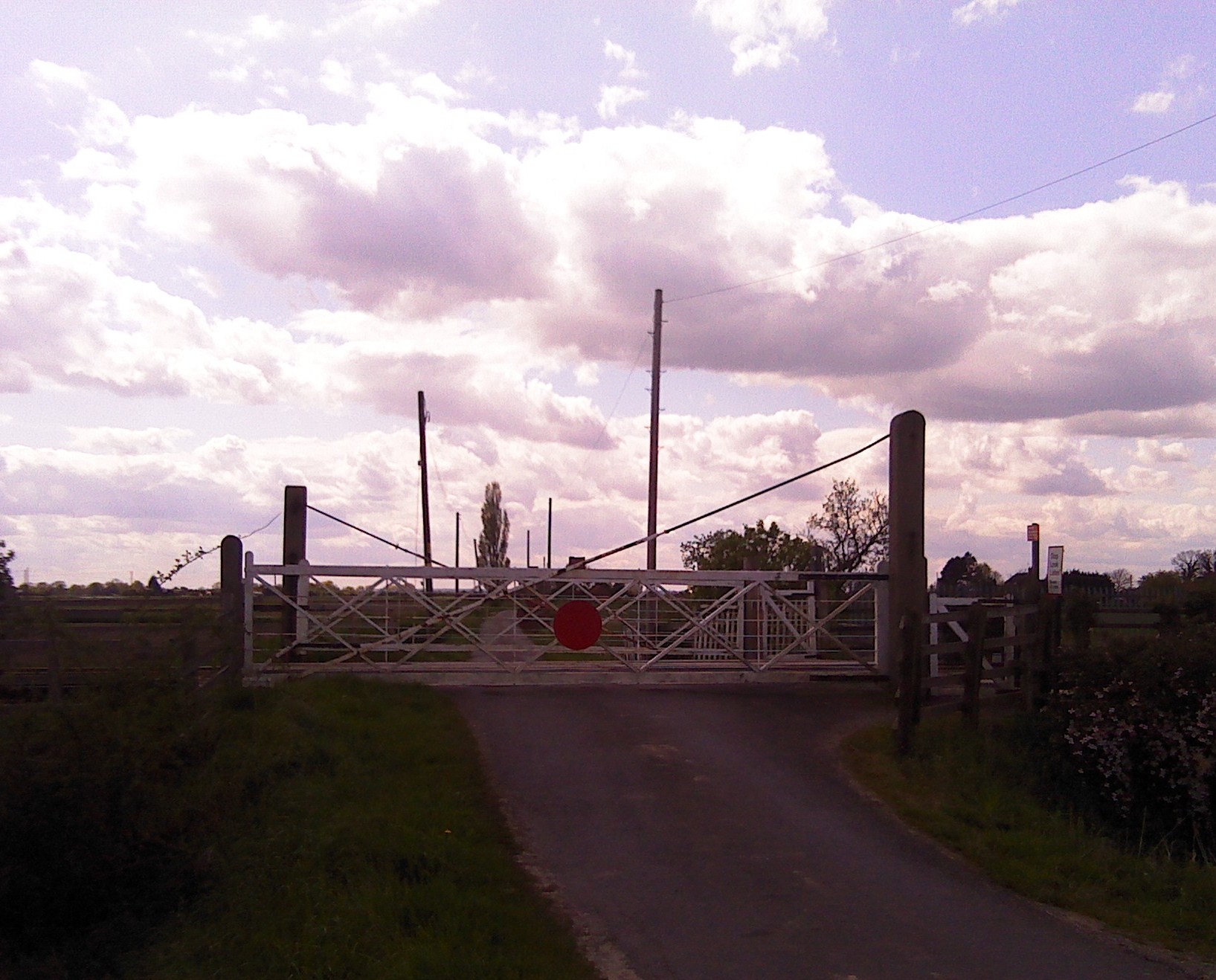 In the Italian highway code, level crossings are called "Passaggi a 