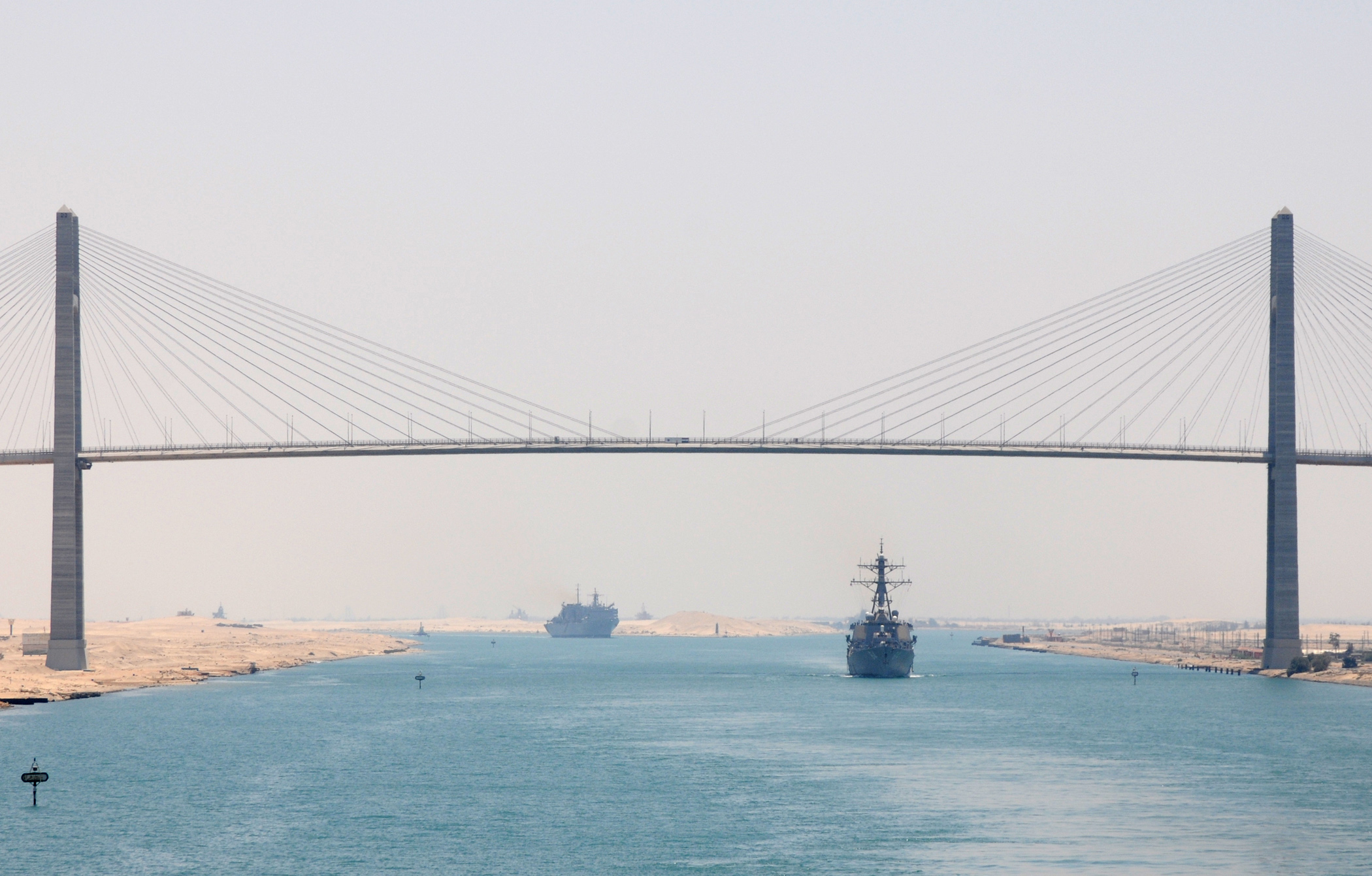 US Navy 100704-N-4236E-334 The guided-missile destroyer USS Carney (DDG 64) passes under the Egyptian-Japanese Friendship Bridge while transiting the Suez Canal.jpg