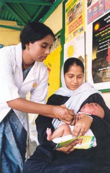 An infant being immunized in Bangladesh Babyimmunization.jpg