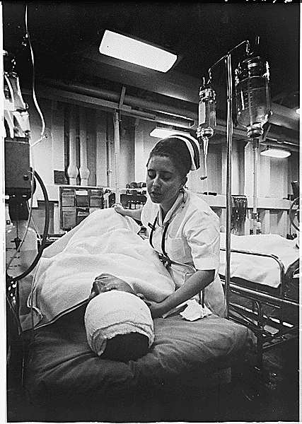 Wounded_American_Soldier_by_R.D._Moeser,_1967_(NARA).jpg