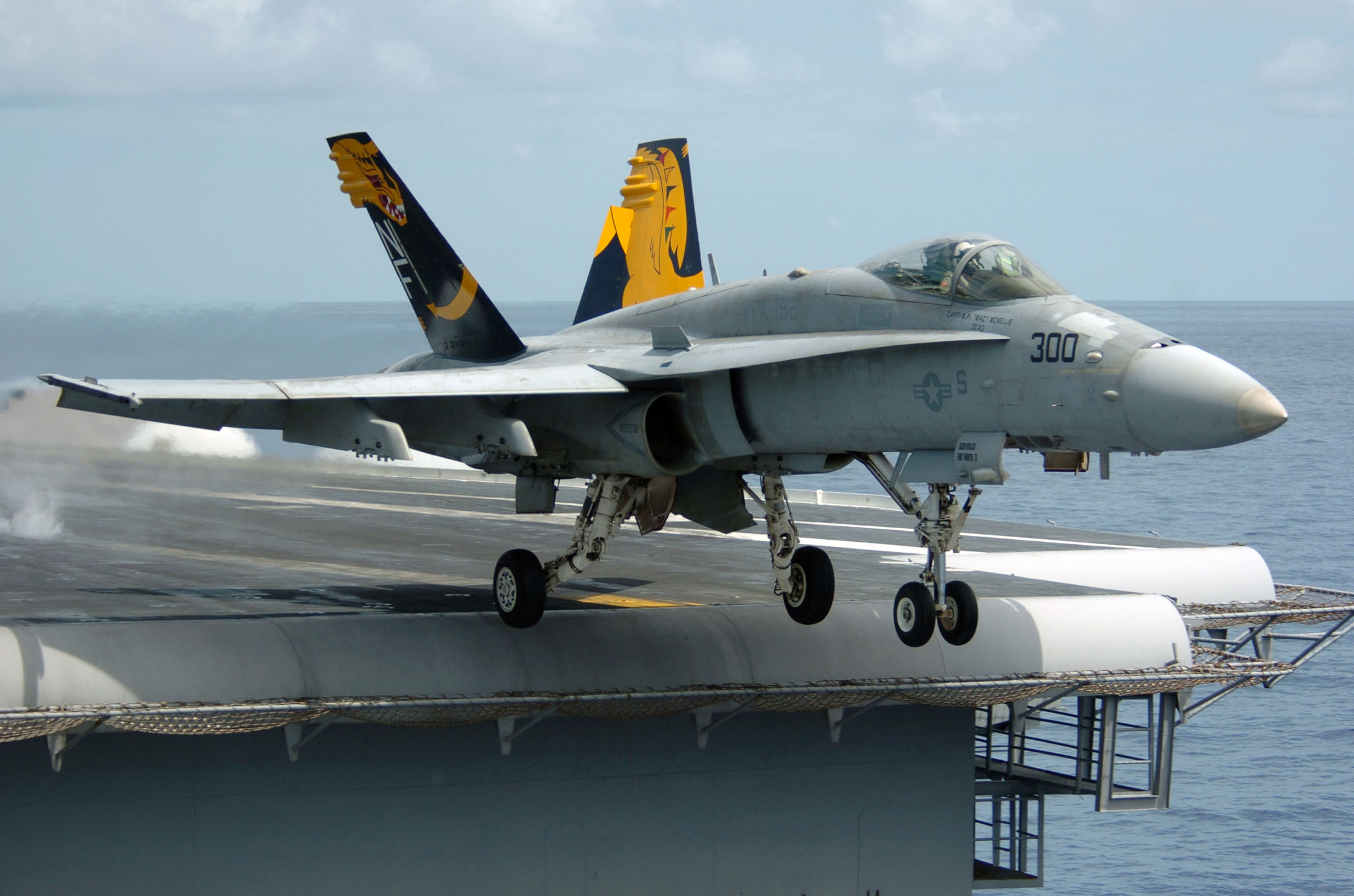 http://upload.wikimedia.org/wikipedia/commons/4/49/An_F-A-18C_Hornet_launches_from_the_flight_deck_of_the_conventionally_powered_aircraft_carrier.jpg