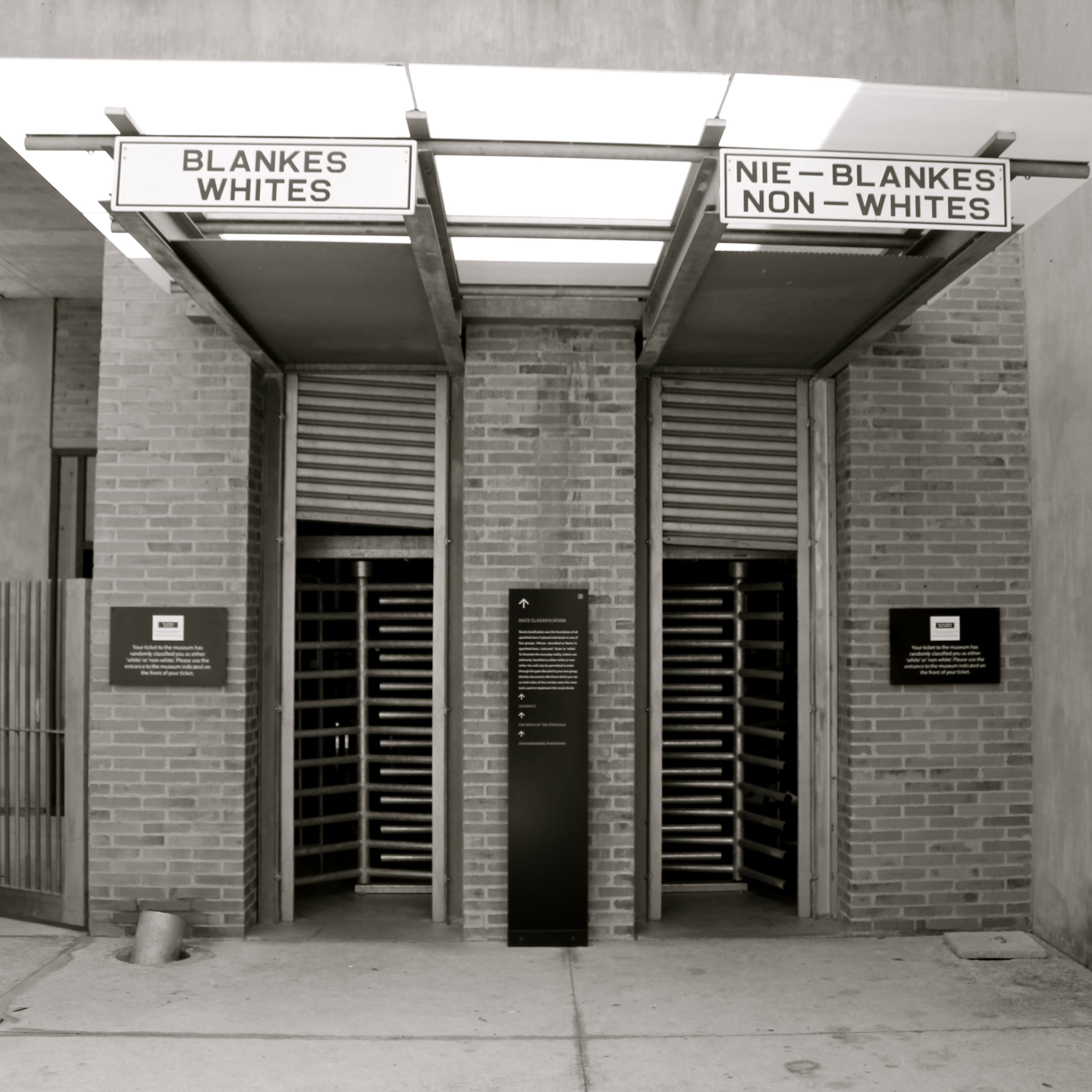 http://upload.wikimedia.org/wikipedia/commons/4/4b/Apartheid_Museum_Entrance,_Johannesburg.JPG