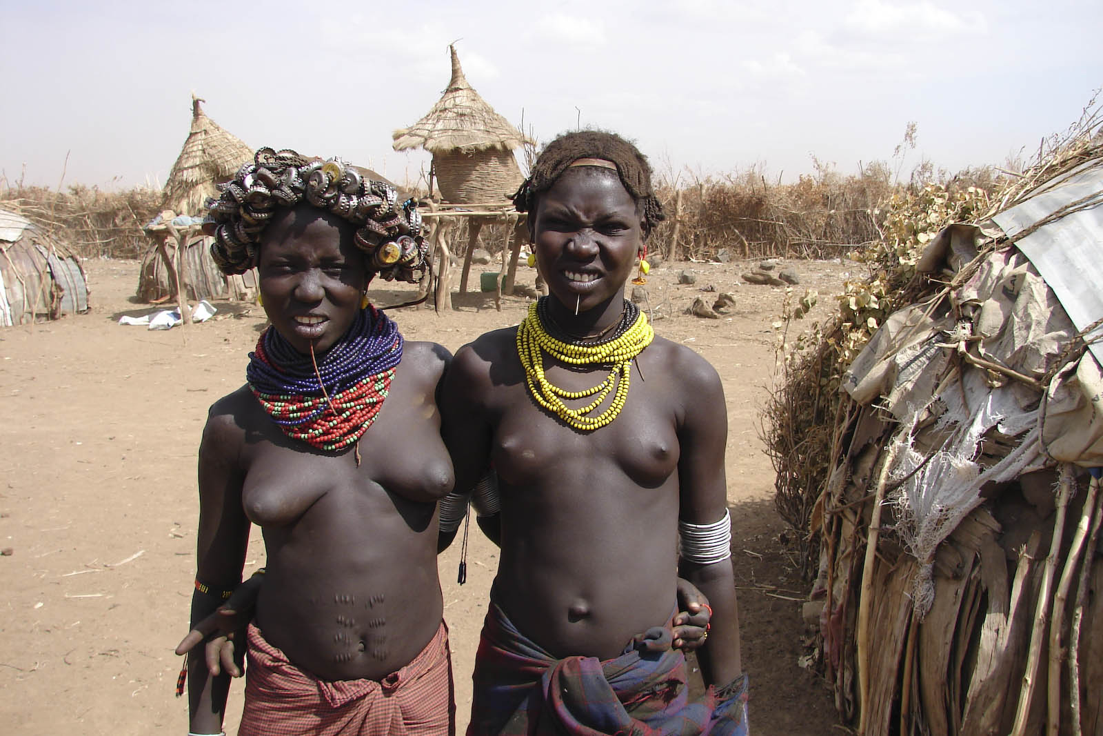 Nude women with tribal people