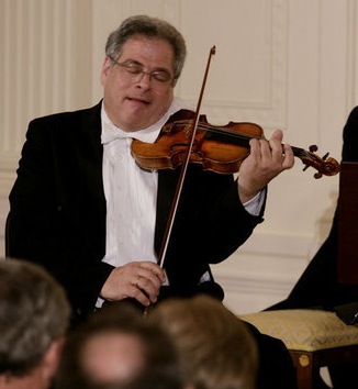 Itzhak Perlman, a polio survivor, plays the vi...