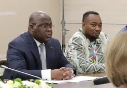 Eteni Longondo (right) alongside the president Félix Tshisekedi in Sochi (Russia) in October 2019