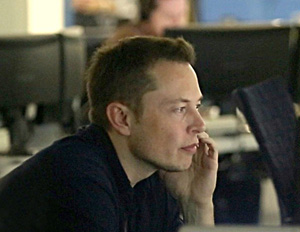 http://upload.wikimedia.org/wikipedia/commons/5/5d/Elon_Musk_in_Mission_Control_at_SpaceX.jpg