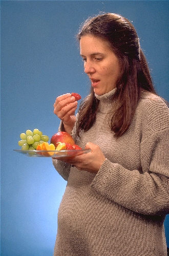 pregnant woman. File:Pregnant woman eating.jpg