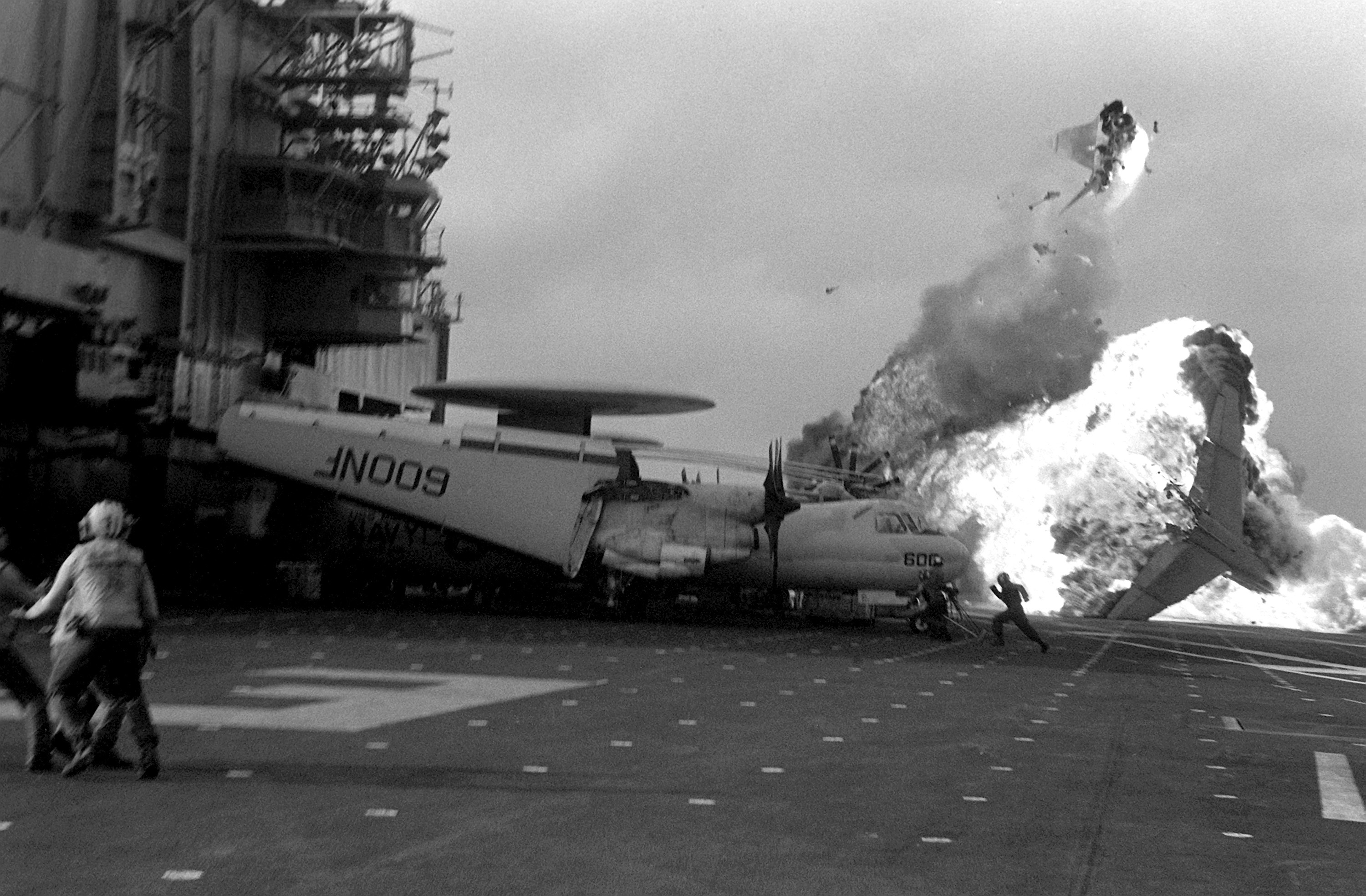 http://upload.wikimedia.org/wikipedia/commons/6/69/A-7E_Corsair_bursts_into_flames_aboard_USS_Midway_(CV-41).jpg