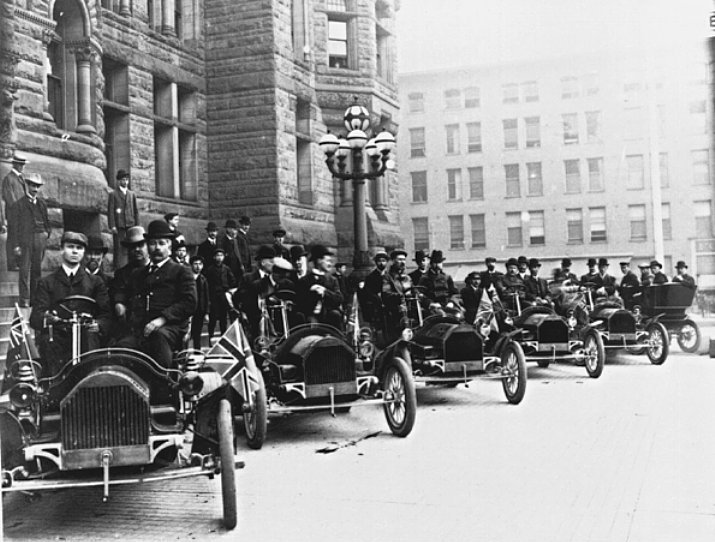 Line of Russell cars outside Toronto City Hall