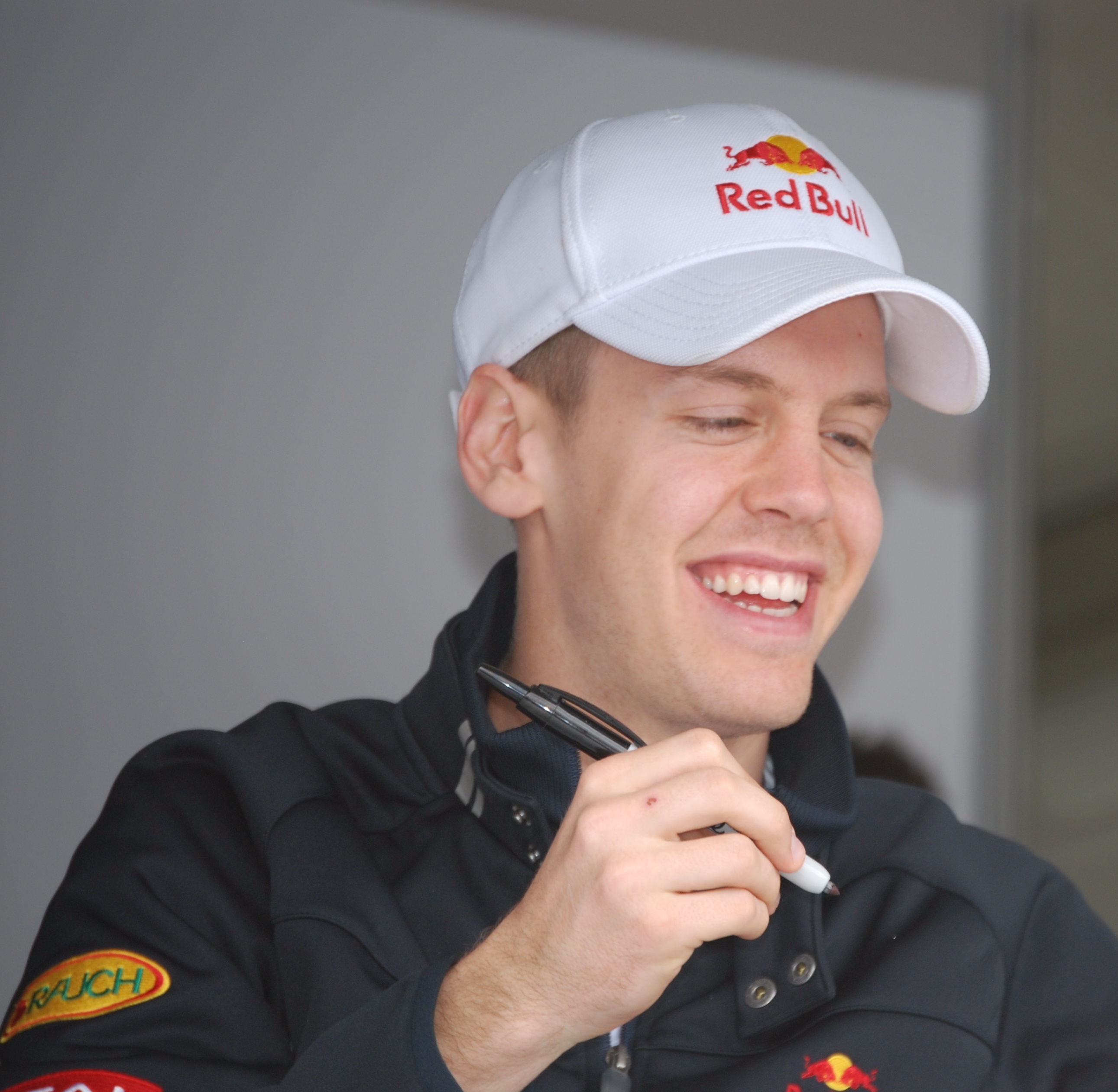 http://upload.wikimedia.org/wikipedia/commons/6/6d/Sebastian_Vettel_2009_Australia.jpg