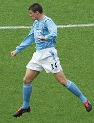 Joey Barton heading a ball during a match in 2004.