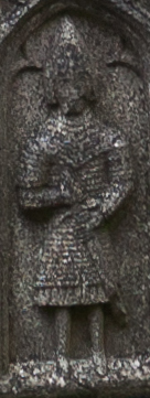Photograph of an inscription of an armed figure on a stone effigy
