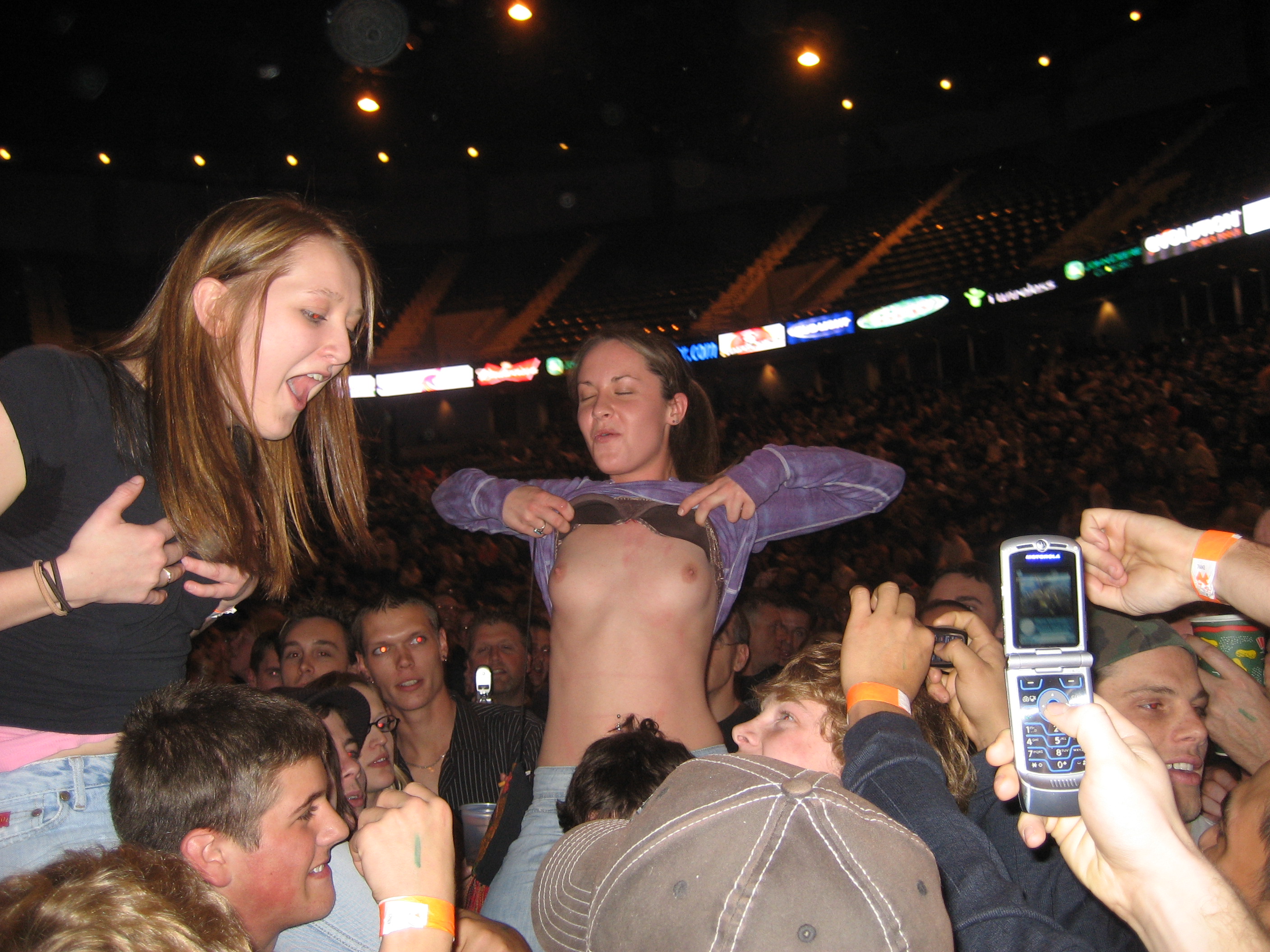 Women stripped naked at concert