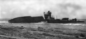 Destroyed Japanese patrol boat wake.jpg