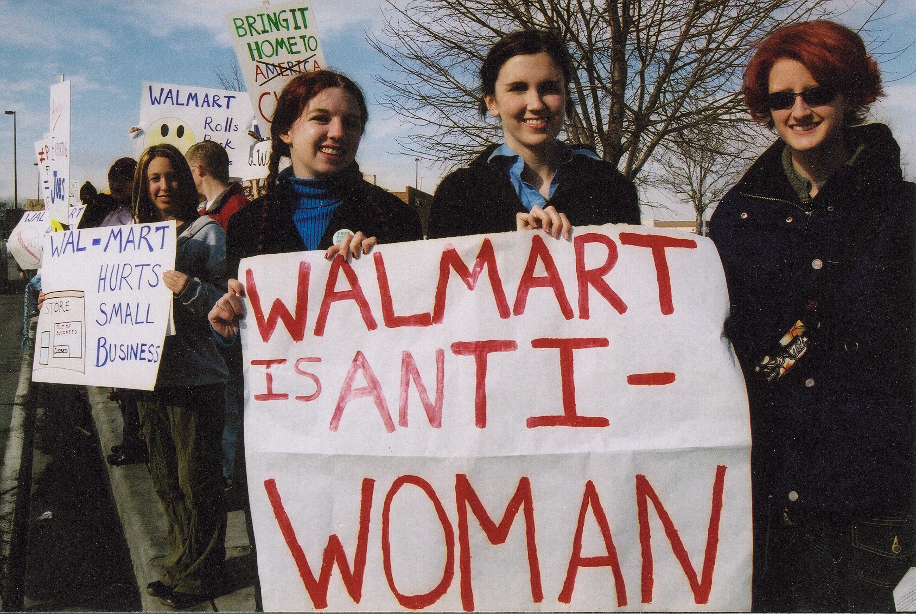 http://upload.wikimedia.org/wikipedia/commons/8/83/Wal-Mart_protest_in_Utah.jpg