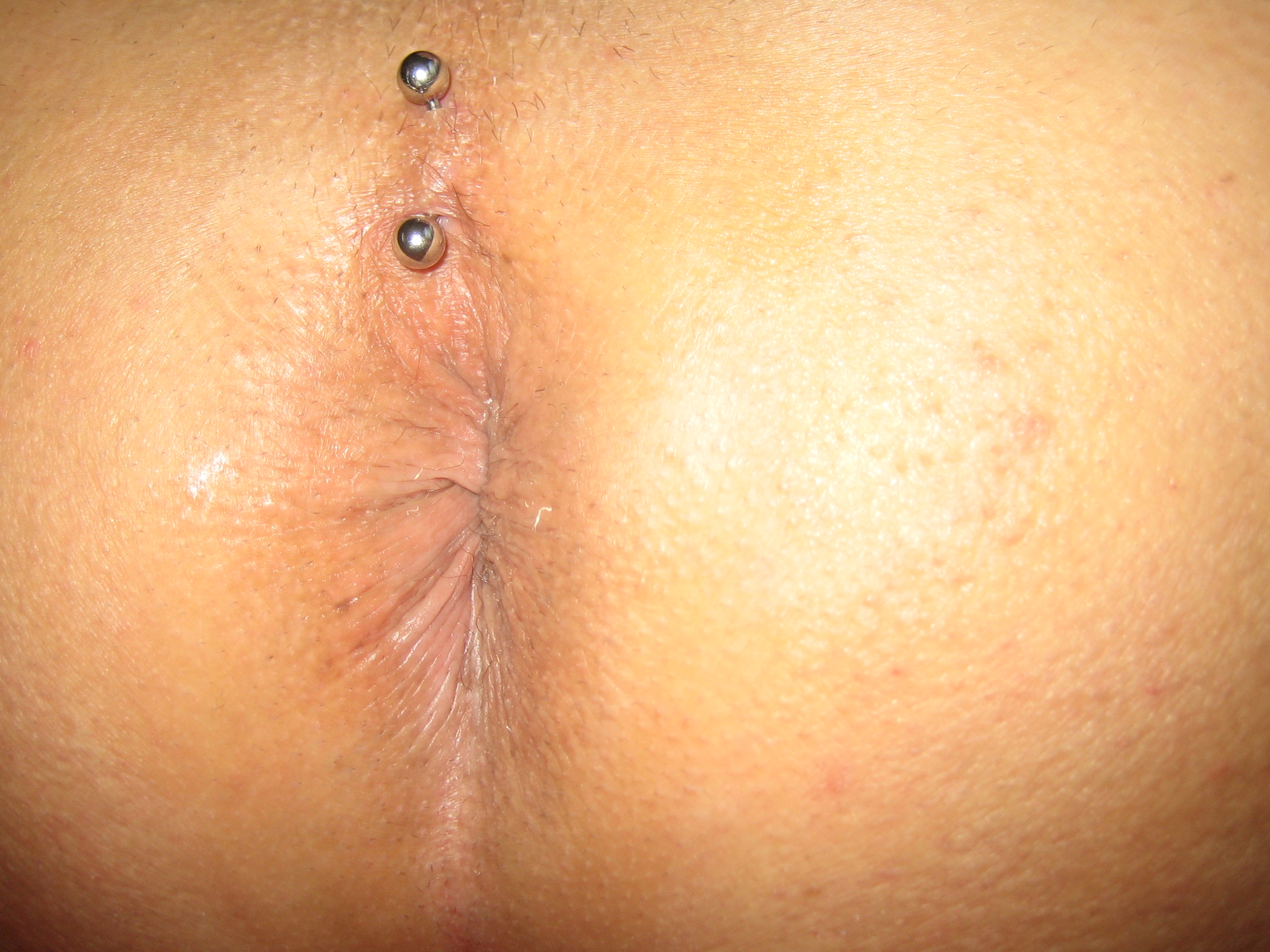 Pierced asshole