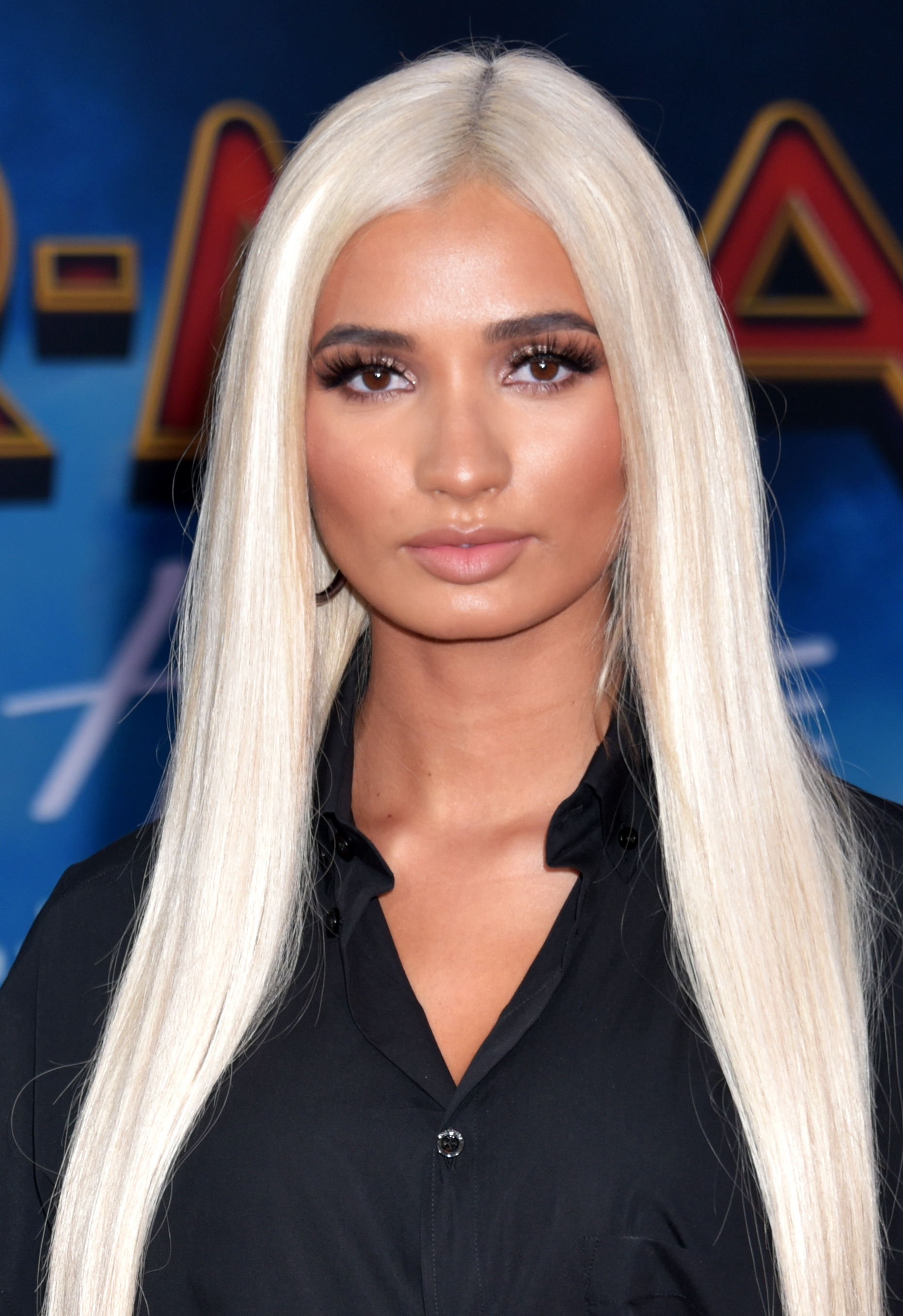 The 27-year old daughter of father Peter Perez Jr and mother Angela Terlaje Perez Pia Mia in 2024 photo. Pia Mia earned a  million dollar salary - leaving the net worth at 1 million in 2024