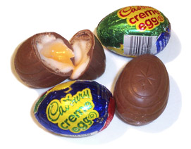 Cadbury eggs, a common Easter candy. One is br...