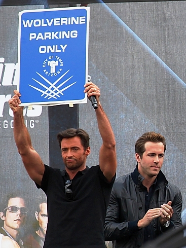 From left to right on stage: Hugh Jackman and ...