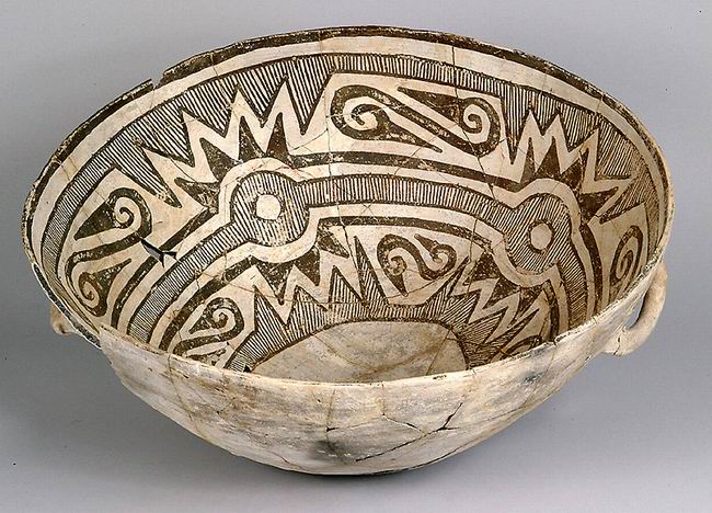 A color picture of a black and white bowl with geometric designs