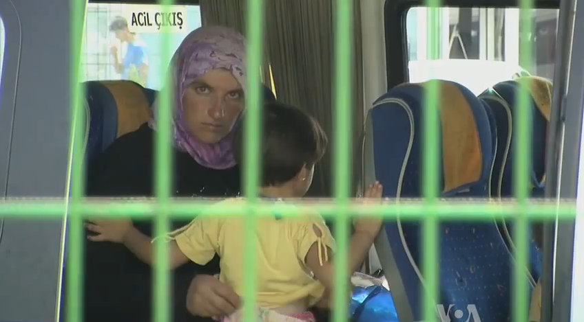 Syrian refugees on a bus in Turkey