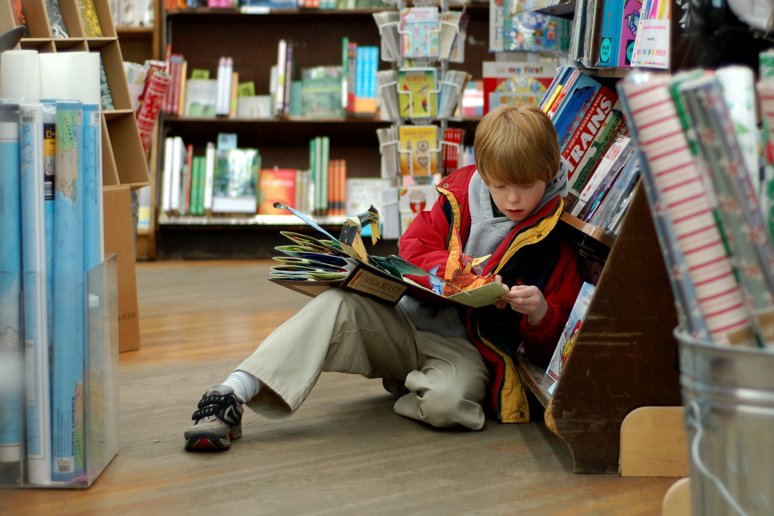 Child Reading at Brookline Booksmith