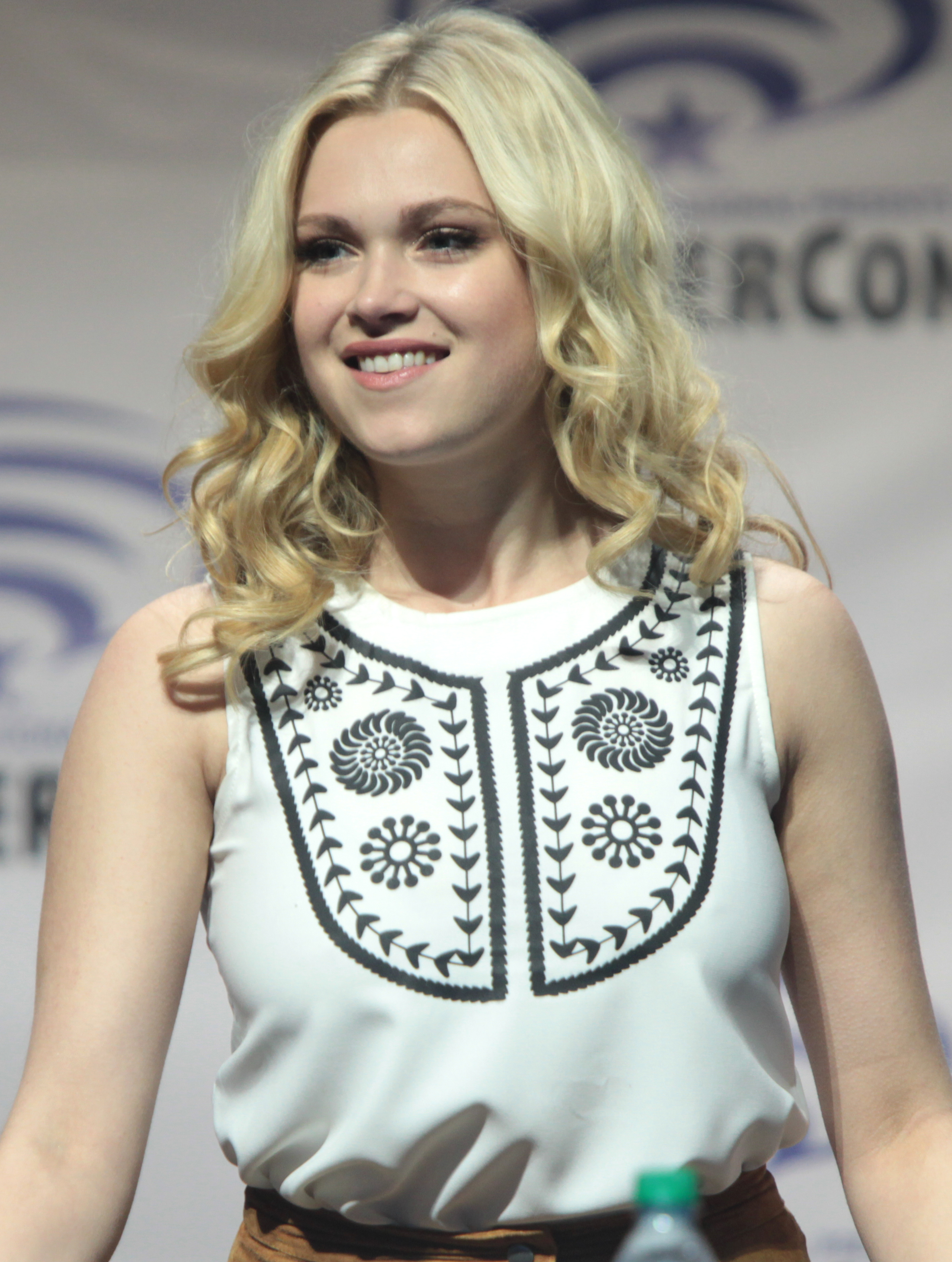 Eliza Taylor  - 2024 Light blond hair & urban hair style.
