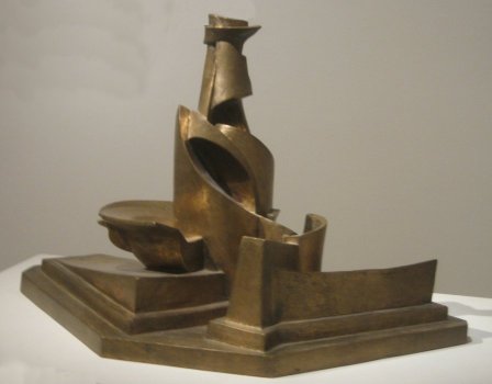 Escultura trOO %27Development_of_a_Bottle_in_Space%27,_bronze_sculpture_by_Umberto_Boccioni,_1913,_Metropolitan_Museum_of_Art