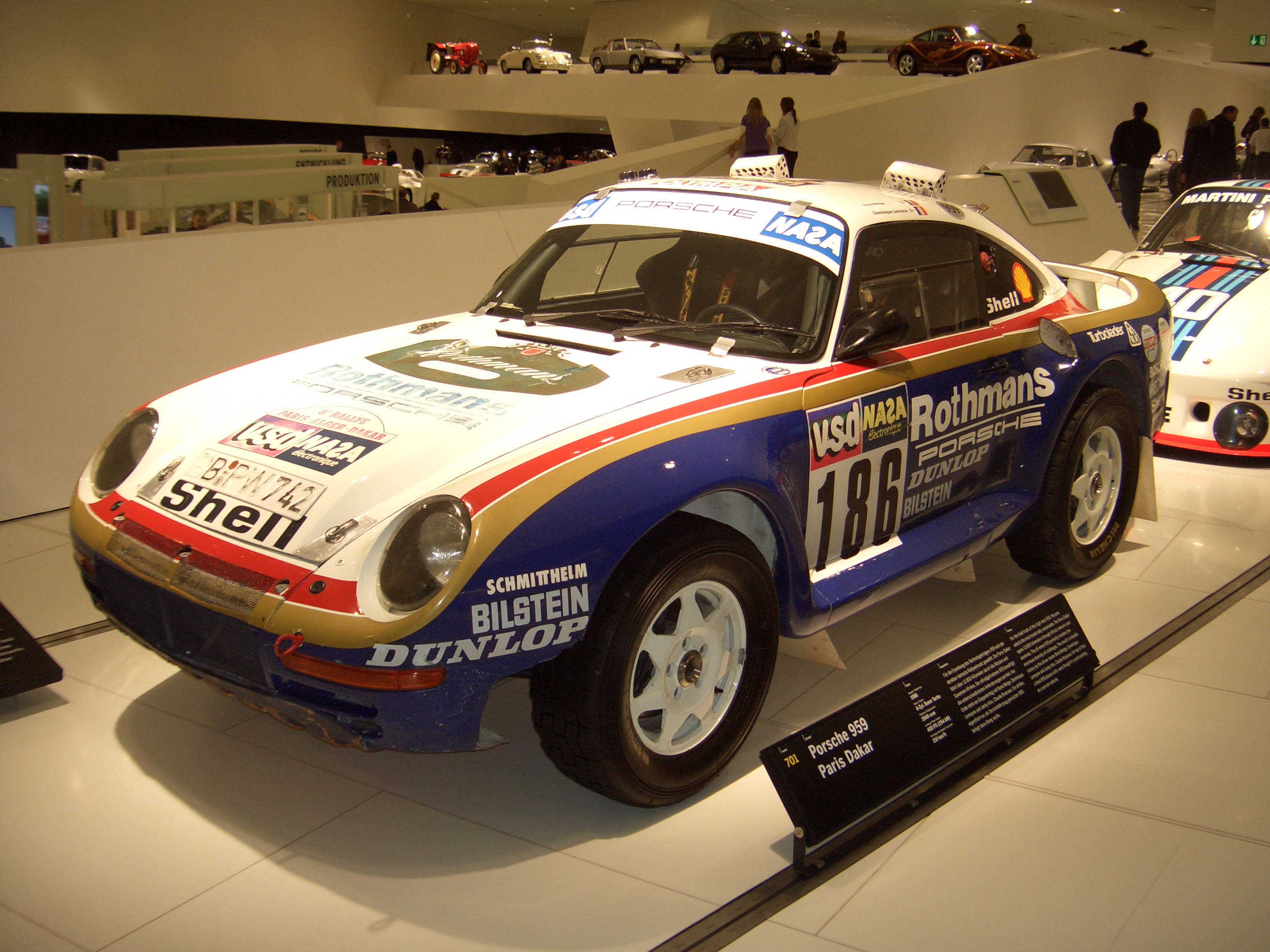 http://upload.wikimedia.org/wikipedia/commons/a/a8/Porsche_959_Coupe_Paris-Dakar_1985_frontleft_2009-03-14_A.JPG