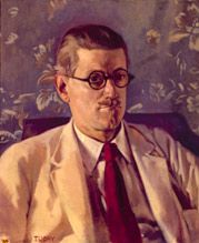 Half-length portait of a fortyish man wearing distinctive Windsor (circular-lens) glasses with black Zylo-covered frames, short and slicked-down brown hair, a small mustache, light tan jacket, and brown tie. His mouth is turned down in a slightly truculent expression
