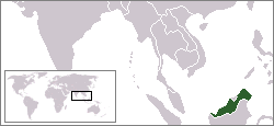A black and white general world map with East Malaysia highlighted in green