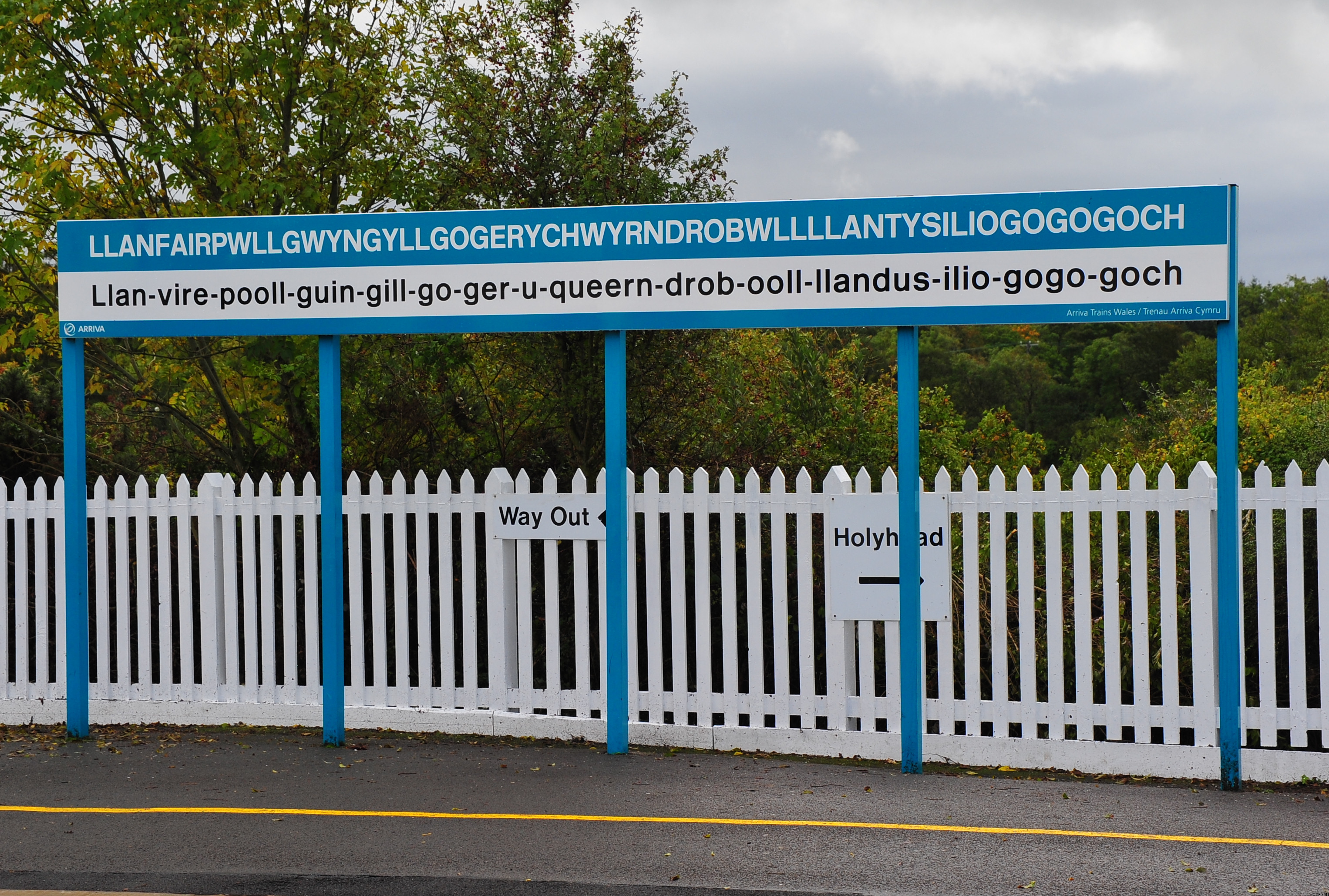 Llanfairpwllgwyngyllgogerychwyrndrobwllllantysiliogogogoch-railway-station-sign-2011-09-21-GR2_1837a.JPG