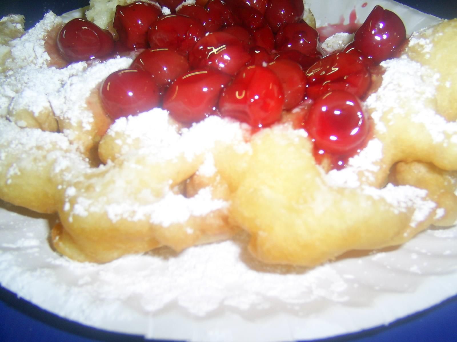 Description Closeup on all American cherry funnel cake.jpg