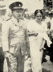 Bandaranaike and her military escort, pictured in 1961 Sirimavo Bandaranaike 1961 (cropped) 5.PNG