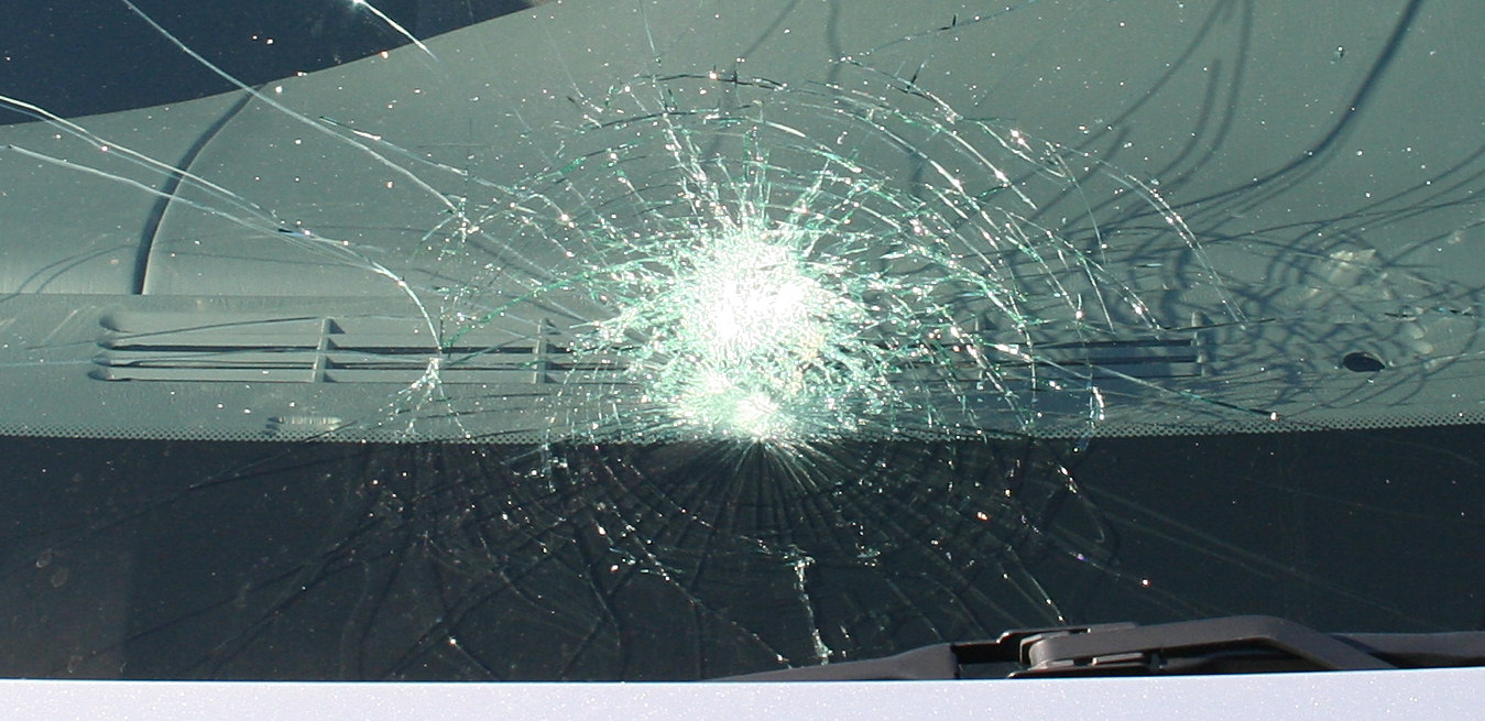 http://upload.wikimedia.org/wikipedia/commons/c/cb/Windshield-spiderweb.jpg