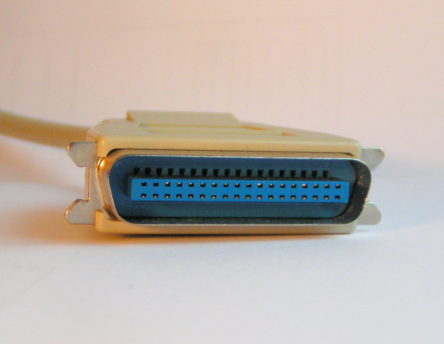 An IEEE 1284 36-pin male Centronics printer cable connection. The computer side normally uses a DB-25 port instead of this "Micro ribbon" connector.